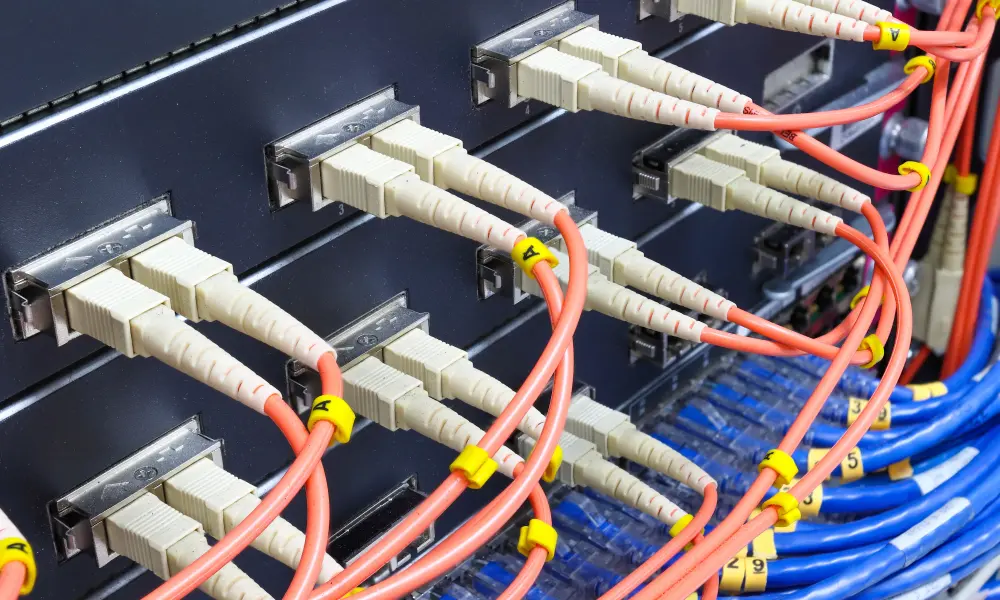 Fiber-optic cable network labeled and connected to switch